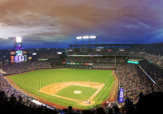 Packed Baseball Stadium During Night Game